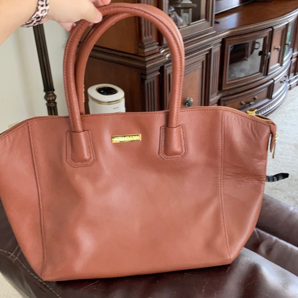 Joy and Iman tan leather tote bag.